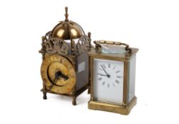 Two 20th century mantel timepieces. Including a French carriage clock and a lantern style clock.