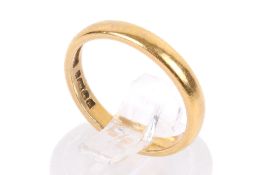 A 22ct gold wedding band. Size K, weight 3.