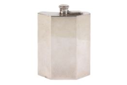 A mid-century silver hip flask.