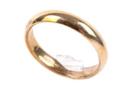 A 9ct gold wedding band. Size X, weight 6g.