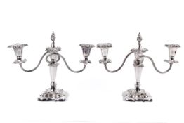 A pair of Mappin & Webb silver plate candelabra.