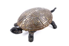 A nickel plated and painted desk bell modelled as a tortoise.