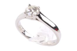 A platinum single diamond ring. Set with a round brilliant cut diamond of circa 0.54ct (0.
