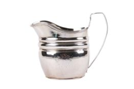 A George III silver milk jug.