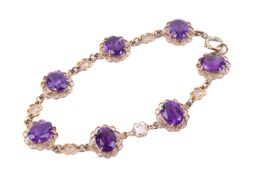 A 9ct gold and amethyst bracelet.