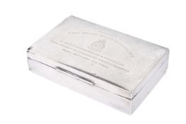 A sterling silver hallmarked presentation cigarette box. Walker & Hall, Sheffield, 1951.