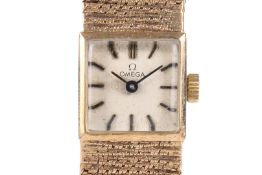 A lady's late twentieth century hallmarked 9ct gold Omega dress watch.
