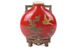 A late 19th century Royal Worcester red ground moon flask.