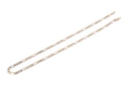 A filed figaro link chain, hallmarked 9ct gold. 500mm length. 16.8 grams gross weight.