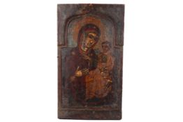 A 17th century or later Russian icon painting on wooden panel 'Madonna and Child'. 18cm x 32.