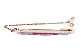 A 15ct gold ruby and diamond bar brooch.