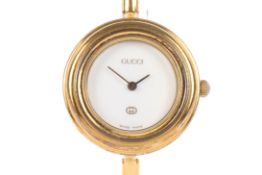 A vintage Gucci 11/12 multi-bezel yellow metal lady's wristwatch.