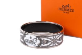 A Hermes enamel bangle.