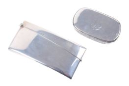 A silver snuff box and a vesta case.