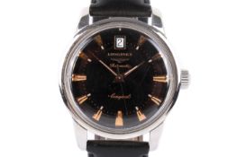 A vintage Longines Conquest automatic gentleman's wristwatch.