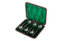 A set of six silver coffee spoons.