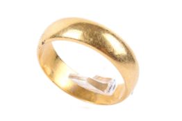 A twentieth century hallmarked 22ct D-section wedding band. Size Q, 5.6mm width. 7.