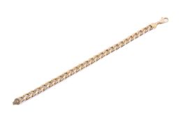 A 9ct gold curb chain. L21.5cm, width of link 0.7cm. Weight 11.7g.