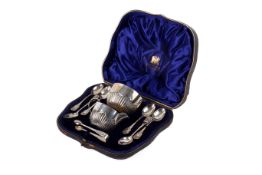 A 1903 silver tea set and a set of six teaspoons.