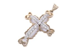 A 9ct gold and white stone cross pendant.