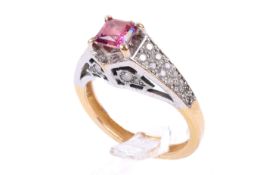 A 21ct red and white stone ring.