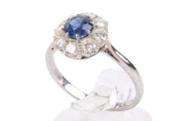 A diamond and sapphire cluster ring.