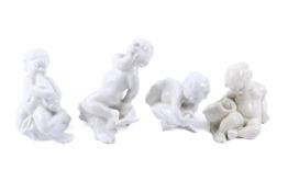 A group of four Bing and Grondahl figurines. Blanc de chine 'sea-children' Max.