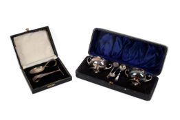 An early 20th century silver cruet set and a baby spoon and pusher.