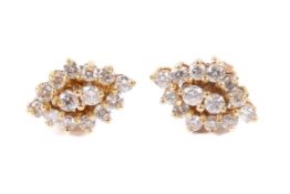 A pair of 9ct gold diamond set rhomboid cluster earrings, weight 2g. Boxed. Circa 1.2cm x 0.8cm.