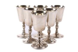A set of six silver sherry goblets.