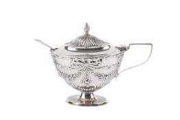 A Victorian silver mustard pot and a later spoon.