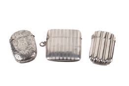 Three Victorian and later silver vesta cases.