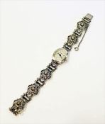 Silber Trachten-Armbanduhr der Firma Bergland, intakt, 22 gr., L 16 cm