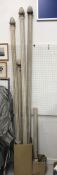 A collection of five curtain poles the tallest approx.
