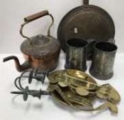 A collection of various metal wares to include a folk art style 19th Century wall rack/rail