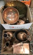 A collection of eleven items of copper and brass ware including a Victorian spittoon of square form