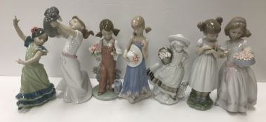 A collection of seven various Lladro figures to include 