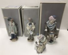 A collection of four Lladro figures 