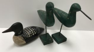 A modern Bundy folk art duck decoy stamped to base 