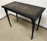 A 19th Century ebonised fold over card t