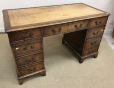 A mahogany kneehole desk in the Georgian