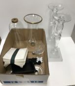 A pair of frosted and clear glass candle