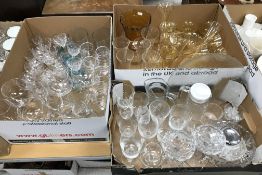 Three boxes of assorted glassware to include champagne flutes, tumblers,