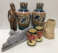 A collection of various Art Deco and similar pottery and artifacts including a painted plaster