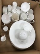 A box containing various Jasper Conran for Wedgwood table wares