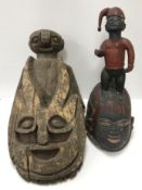 Two wooden painted African masks,