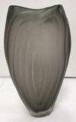 A Catherine Hough studio glass contour vase of compressed ovoid form with looped concave pillar