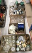 Eight boxes of sundry household items to include various glass storage jars,