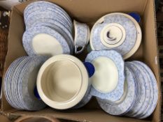 A box containing a Royal Doulton 
