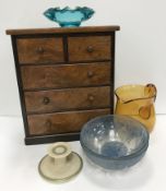 A circa 1900 walnut miniature table top chest of two short over three long graduated drawers,